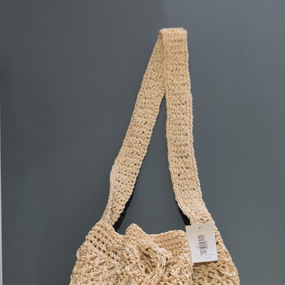 Handwoven Beige Crochet Bucket Bag with Tassels - Picture 3 of 5